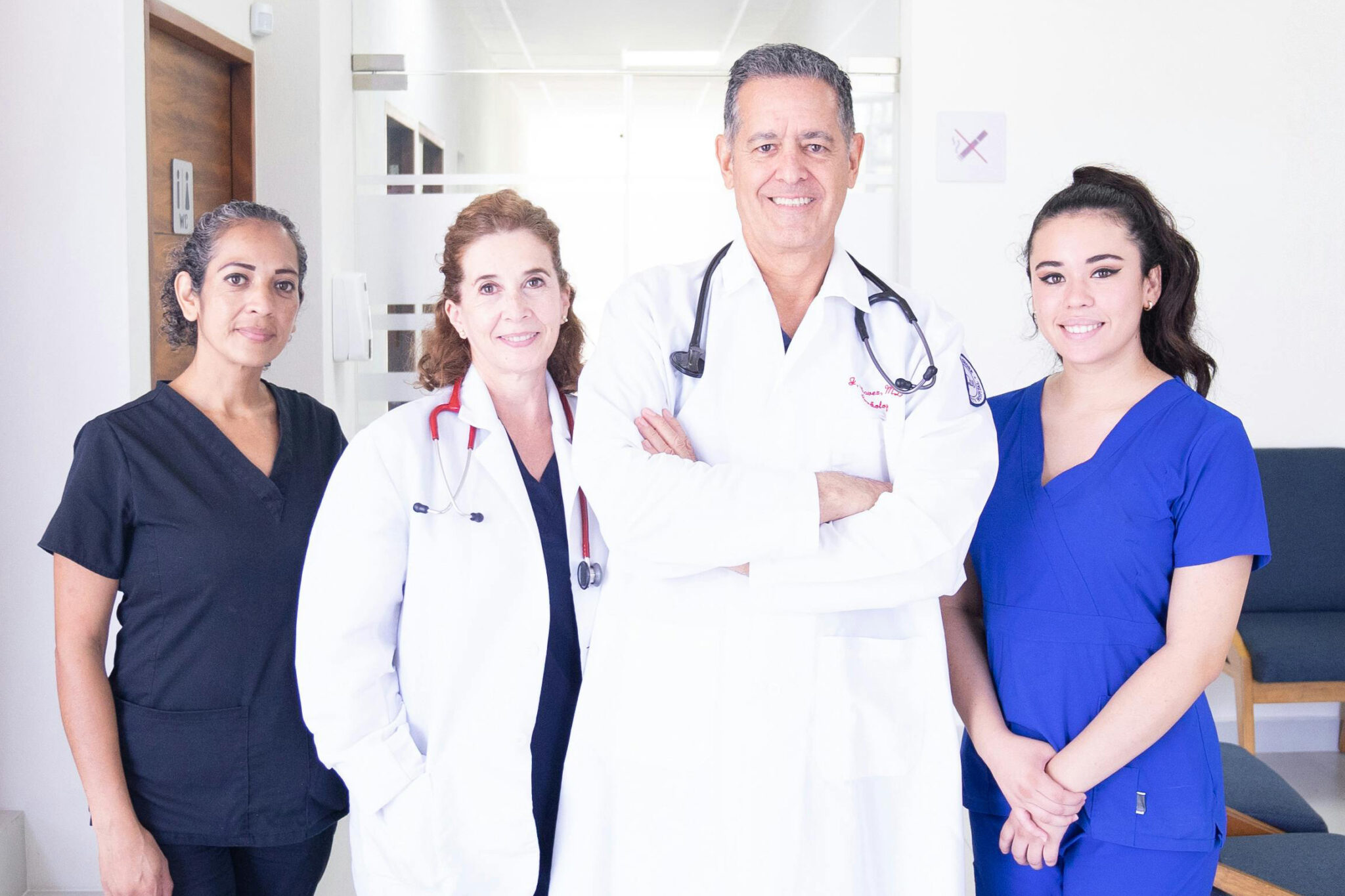 Healthcare team standing together in a hospital.
